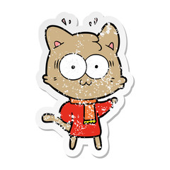 distressed sticker of a cartoon surprised cat wearing warm winter clothes