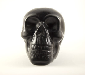 figure black human skull on white background