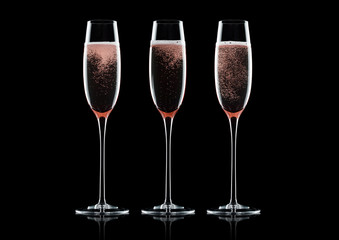 Rose pink champagne glasses with bubbles