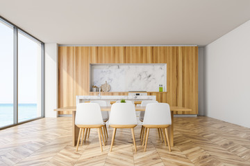 Wooden loft kitchen interior with bar and table