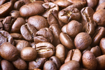 Roasted coffee beans, closeup. Background.