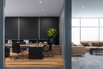 Gray manager office with lounge area