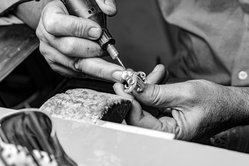 hands of jewelry technician