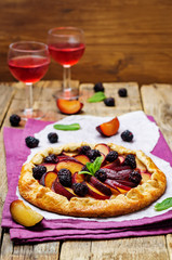 Plum blackberry galette with fresh blackberries and plum slices