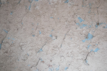 Wall fragment with scratches and cracks