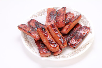 Fried sausage on paper towel to drain and soak up the grease.