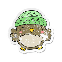 distressed sticker of a cute cartoon owl in hat