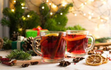 Winter white drink with spices on festive new year background