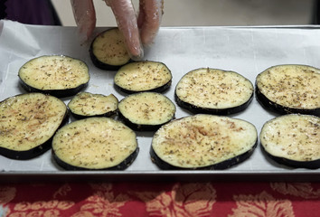 Sliced squash being prepared for baking