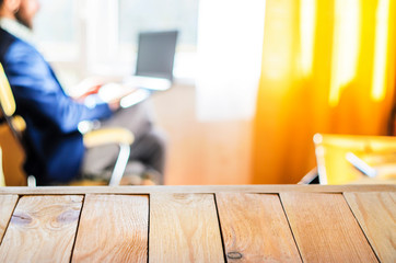 Wooden Table Top Against Interior Background