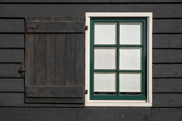 Black wall with white window frame