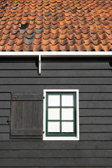 Black wall with white window frame
