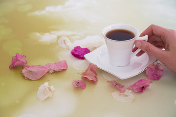 pink roses leaves on the background for happy women day ,teacher day, mother day, 8 March day, coffee concept in the cafe.