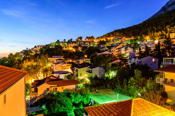 Night view of Baska Voda. Baska Voda - a beautiful tourist village on the Adriatic coast, Dalmatia...