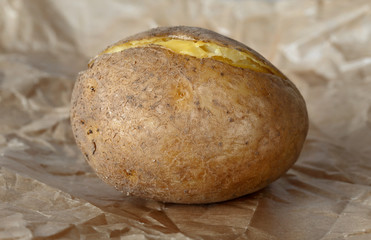 Boiled potato on crumpled paper