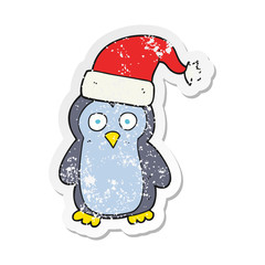 retro distressed sticker of a cartoon penguin