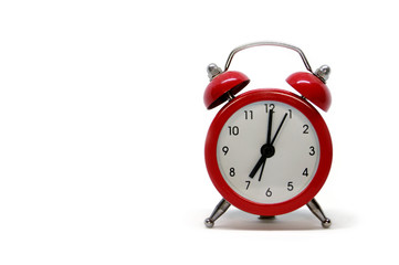 Red clock on white background.