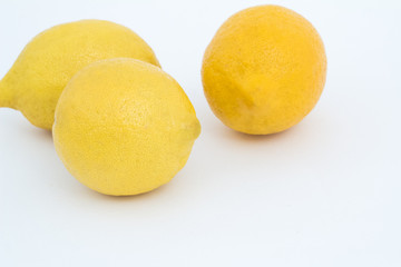 Lemon on a white background and in a cut.