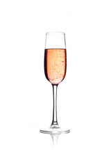 Rose pink champagne glass with bubbles isolated on white background