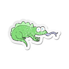 retro distressed sticker of a cartoon lizard