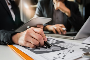 business people shaking hands finishing up meeting