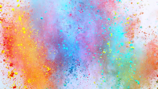 Super slowmotion shot of color powder explosion isolated on white background.