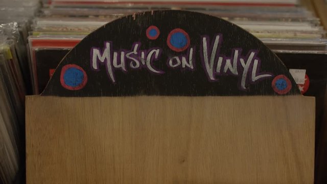Shopping in a modern vinyl record music store
