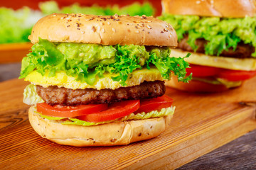 Juicy hamburger with lettuce and tomato fries homemade