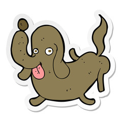 sticker of a cartoon dog sticking out tongue
