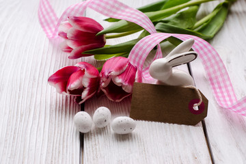 Spring flowers on a wooden background . - Image