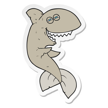 sticker of a cartoon laughing shark