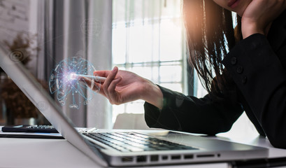 businesswoman working on laptop in office