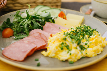 wonderful breakfast in the outdoors.  scrambled eggs with bacon and herbs and  cheese