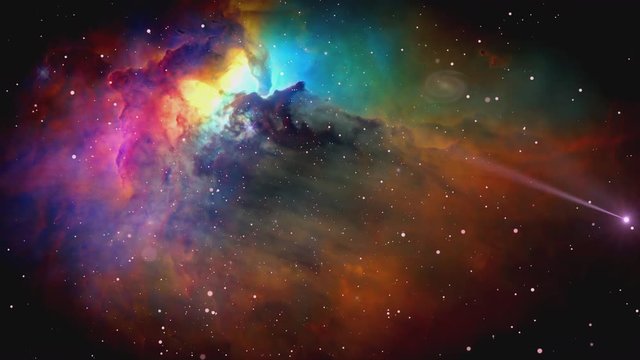 An abstract vision of traveling through space with a nebulae in the distance. Stars and a comet zoom past the camera. Imagery from NASA.  	