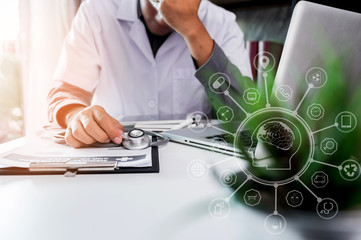 Overworked doctor sitting in office