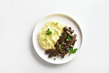 Beef liver with mashed potatoes