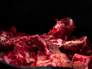 A raw pork rib isolated with black background