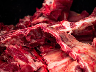 A raw pork rib isolated with black background