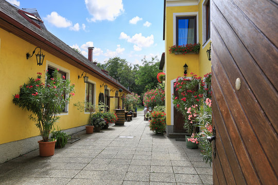 Courtyard of the heuriger house - Austrian traditional wine tavern. Market town of Perchtoldsdorf, Lower Austria.