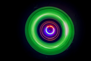 Concept of speed - Trail of fire and smoke - Vinyl record. Burning vinyl disk. Turntable vinyl record player. Retro audio equipment for disc jockey. Sound technology