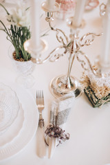 Classical candlestick on white table