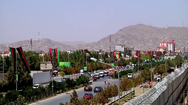 2018 - Flags fly high over Afghan parliament building in Kabul, Afghanistan.