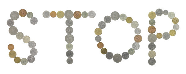 STOP word with old coins on white background