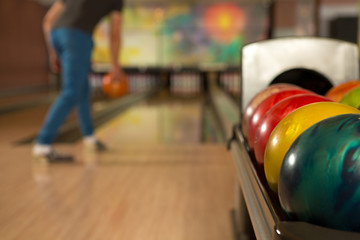 Man playing bowling alone at the club