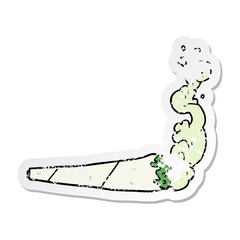 distressed sticker of a cartoon marijuana joint
