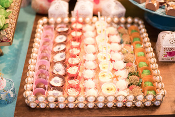 Sweets and decoration on the table - Children's birthday garden theme