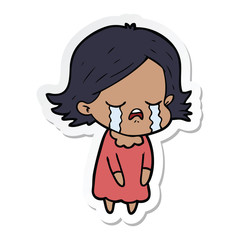 sticker of a cartoon girl crying