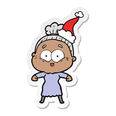 sticker cartoon of a happy old woman wearing santa hat