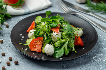 Caprese salad with mozzarella and tomato