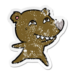 distressed sticker of a cartoon bear showing teeth